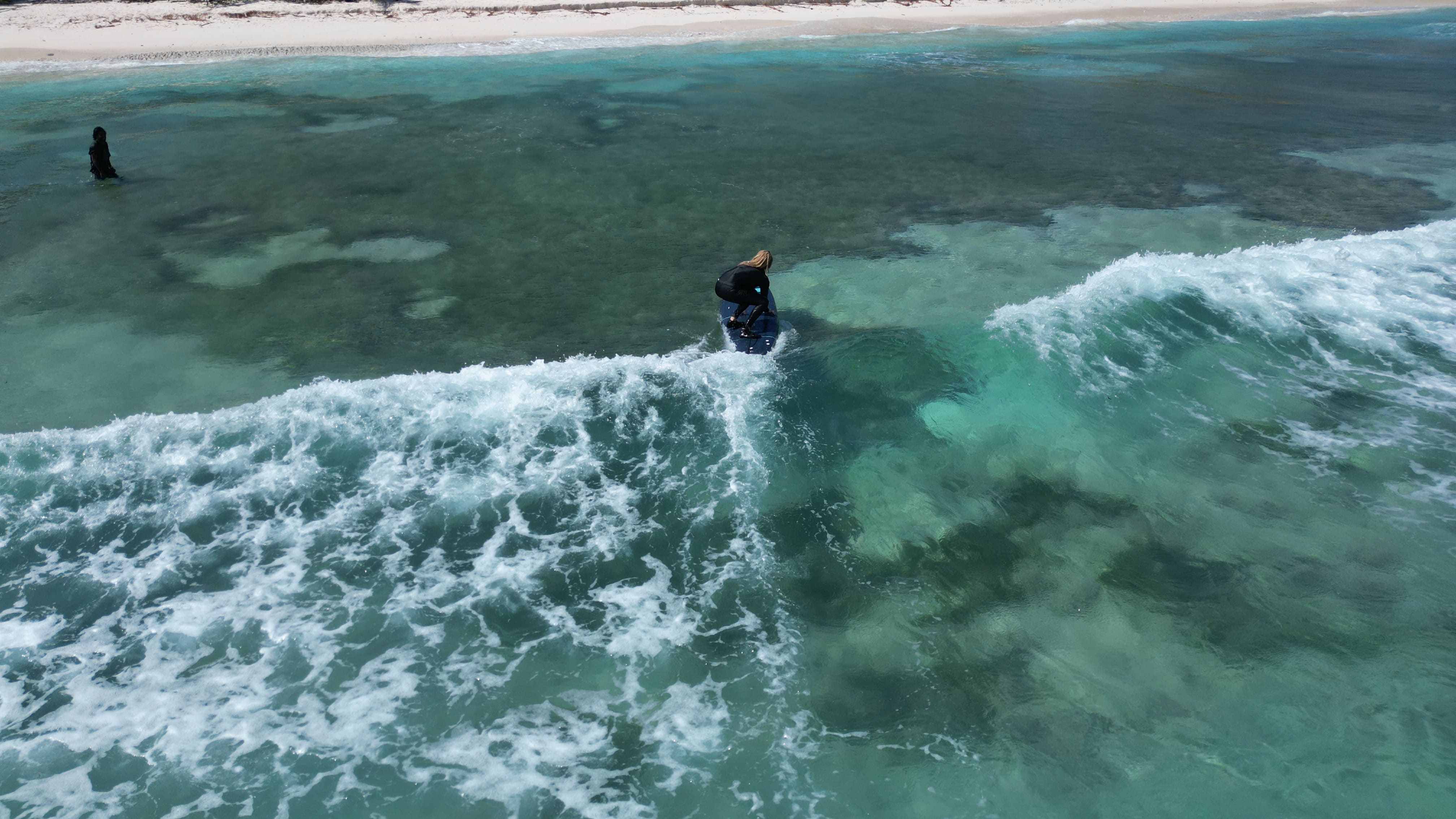 Student practicing surf techniques
