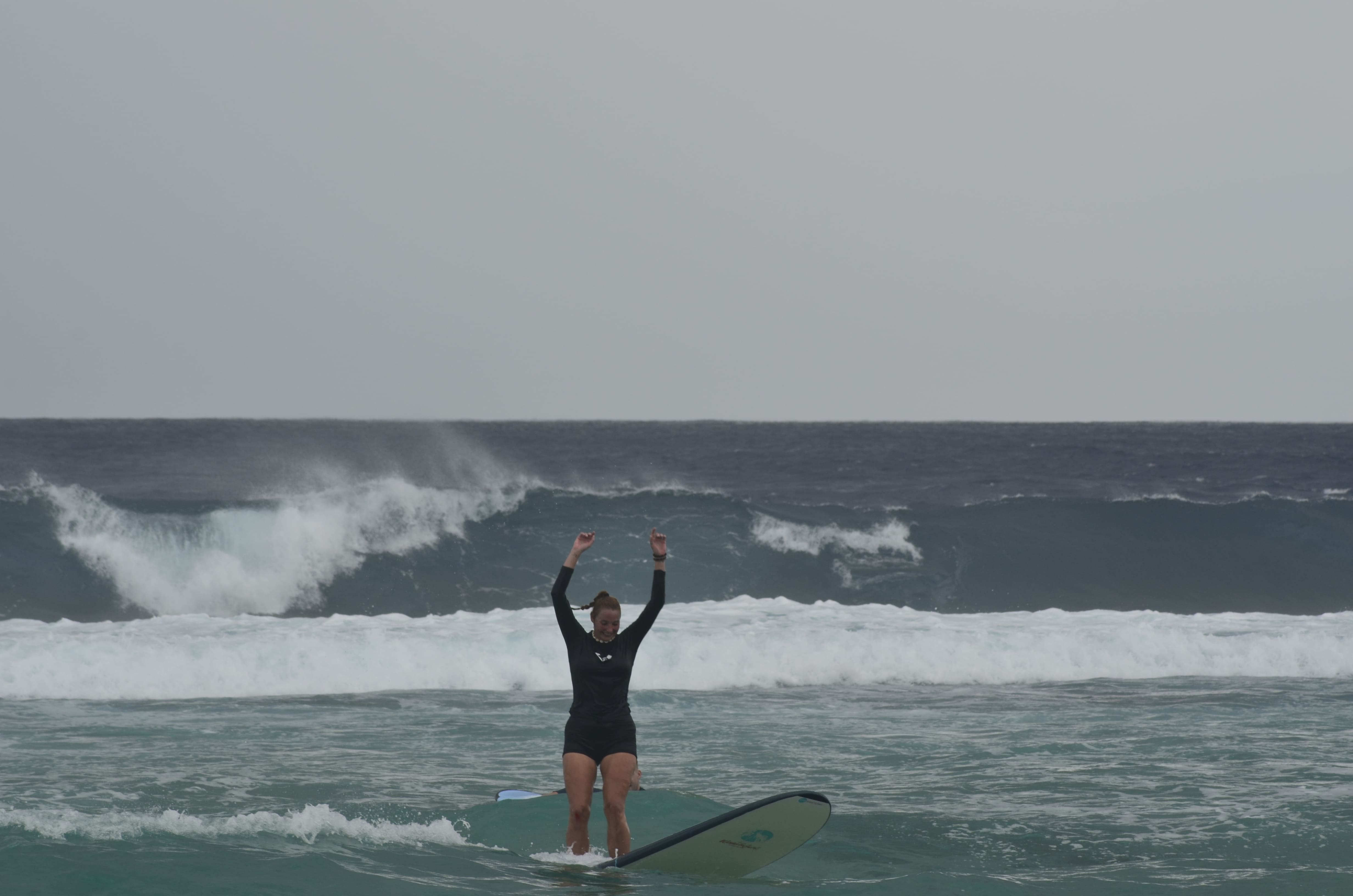 Student practicing surf techniques