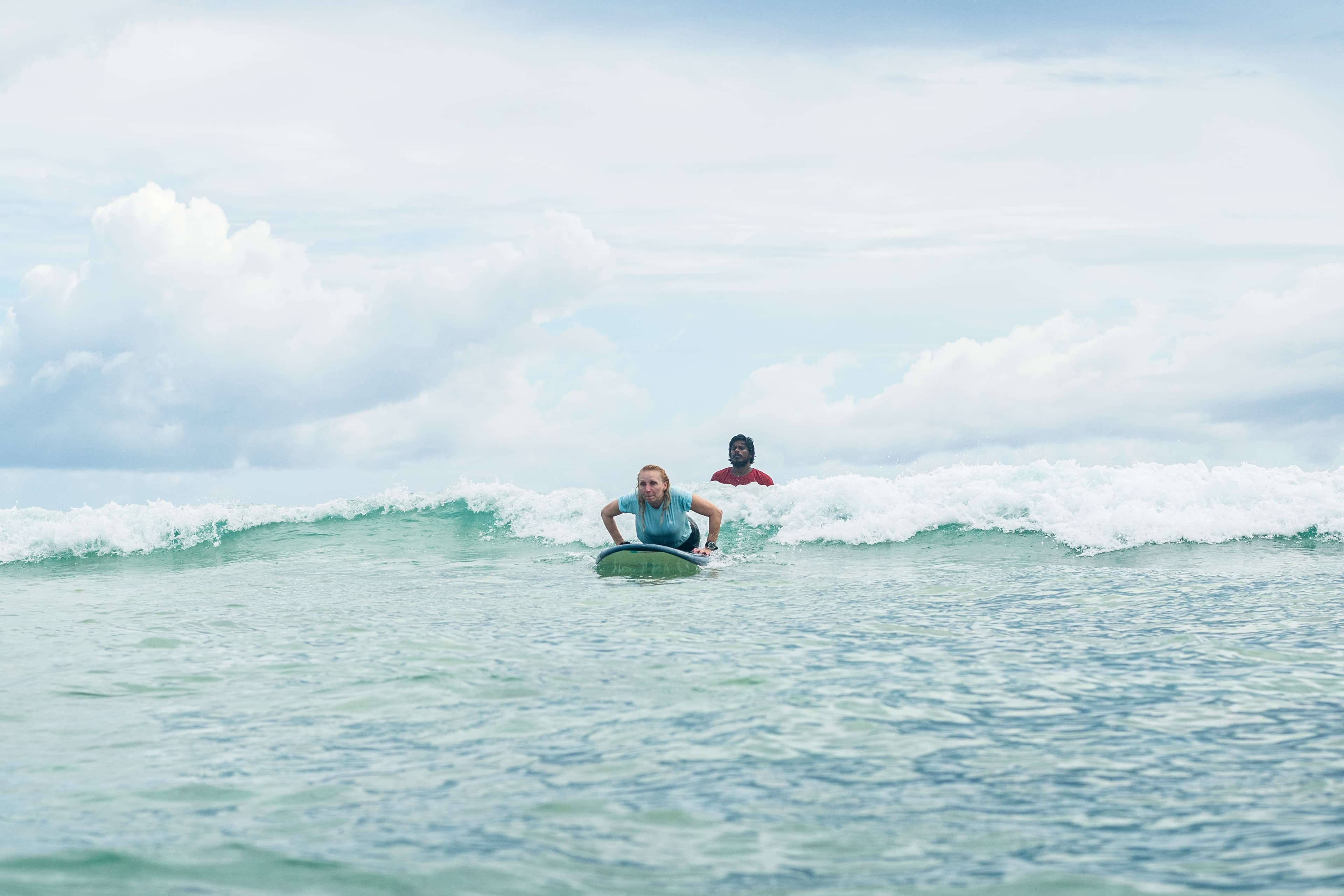 Student practicing surf techniques