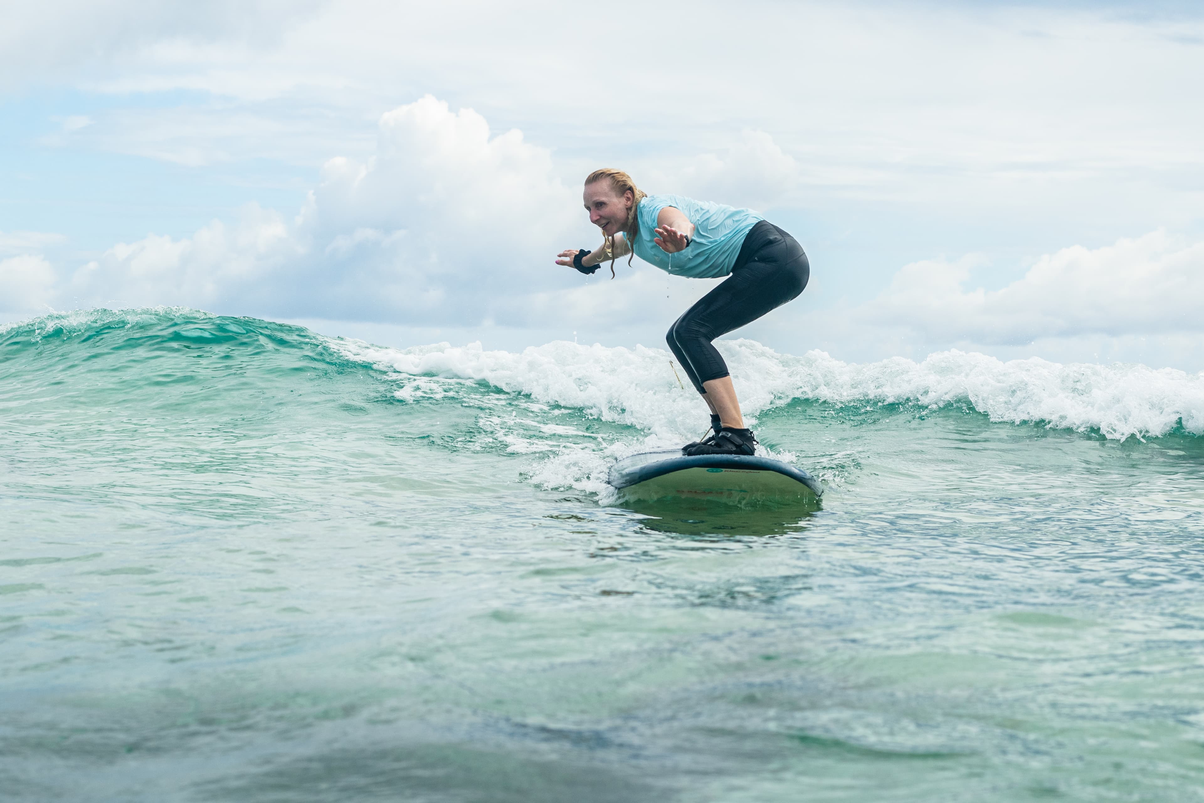 Student practicing surf techniques