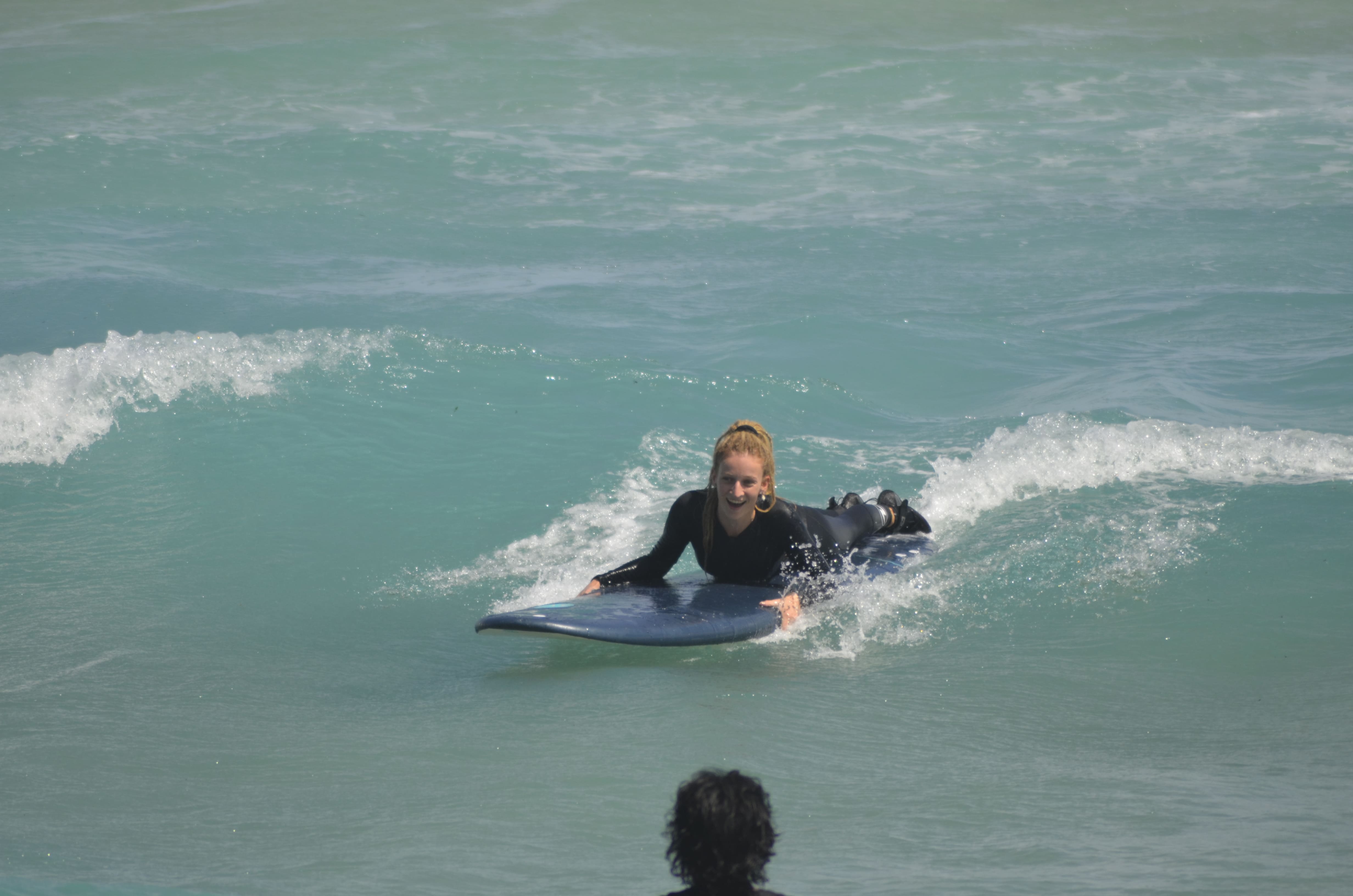 Student practicing surf techniques